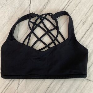 Lululemon size 8 black sports bra (no inserts included)